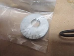 Oem # TA01-28-473 New Front Upper Arm Cam Washer. Fixed Price $9.88.