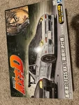 Aoshima 1/24 Initial Takahashi Ryosuke FC3S Mazda RX-7 Hakone Battle Model Kit. Fixed Price $35.95.
